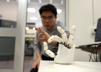 Wristband permits wearers to manage a robotic hand with their very own actions | MIT Information