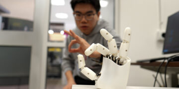 Wristband permits wearers to manage a robotic hand with their very own actions | MIT Information